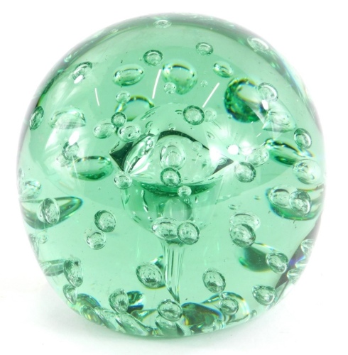 A Nailsea green glass dump, with bubble inclusions, 12cm high.