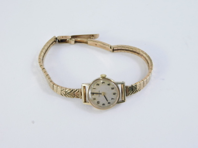 An Omega ladies wristwatch, in a 9ct gold watch head case with silvered dial, on a 9ct gold bracelet, the watch head 1.5cm wide, the bracelet approx 18cm long, boxed, 18.3g all in. - 2