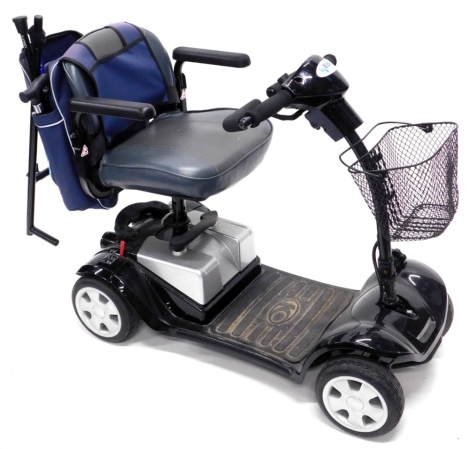 A mobility scooter, in black livery with charger and some accessories etc., plus key.