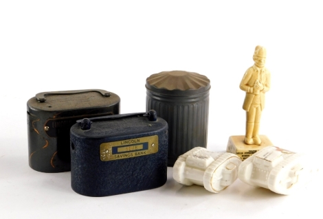 Lincoln related items, to include a crested model of a tank stamped made in Lincoln, another British tank with Lincoln crest, Lincoln savings bank money box, a Lincoln savings bank home safe, a novelty tin, dustbin shaped box and cover, and a figure title