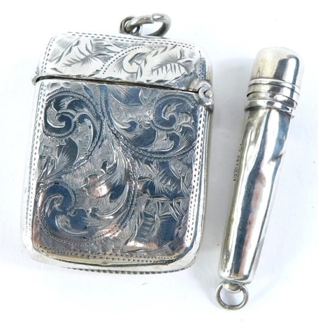 A late Victorian silver Vesta case, engraved with leaves, flowers, etc., Birmingham 1896, and a cheroot holder. (2)