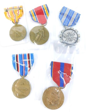 Five various USA medals, to include Asiatic-Pacific Campaign, Naval Reserve, American Campaign, World War II and Meritorious Achievement. (5)