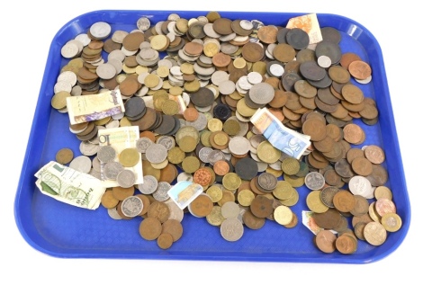 A large quantity of mainly foreign coins, to include a small amount of silver, stamps, banknotes, etc.