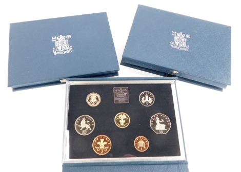 Three United Kingdom Royal Mint proof sets, for 1990, 1994, 1985.