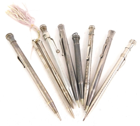 A quantity of silver and silver coloured metal propelling pencils, various makes.