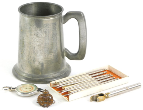 A collection of items, to include a Tank Corp military badge, various crustacean picks, a silver plated corkscrew-bottle opener, a map measurer, and a pewter tankard, titled Kings tankard, engraved with the Monarchs of England.