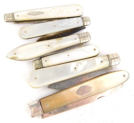 A collection of six 19thC and later fruit knives, each with a mother of pearl handle and a silver blade.