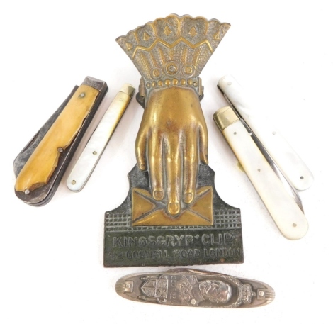 A Victorian Kingsgryp letter clip modelled in the form of a hand, and various pen knives to include Edward Prince of Wales, and the George V commemorative.