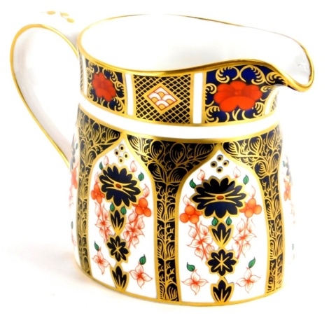 A Royal Crown Derby porcelain milk jug, decorated with the 1128 Imari pattern, 9cm high.