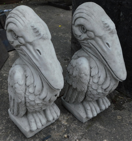 A pair of garden ornaments, each modelled in the form of a Wally bird, 40cm high.