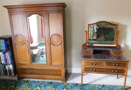 A late Victorian mahogany wardrobe, and dressing chest, with marquetry and satinwood cross banding, wardrobe, 202cm high, 149cm wide, 52cm high, dressing chest, 162cm high, 107cm wide, 51cm deep