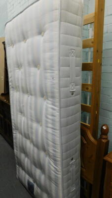 A pine single bed frame, and a Sleepvendor Valetta orthopedic single mattress.