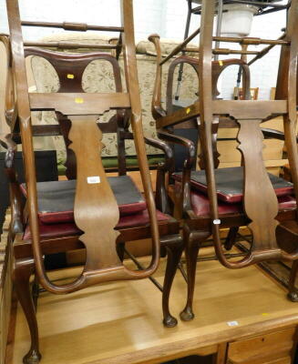 A quantity of Queen Anne style mahogany dining chairs, with drop in seats. The upholstery in this lot does not comply with the 1988 (Fire & Fire Furnishing) Regulations, unless sold to a known exporter or upholsterer it will be cut from the frame before l