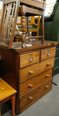 A Victorian mahogany chest of two short and three long drawer, (AF), and a pair of oak dining chairs.