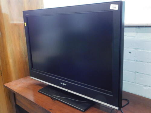 A Sony Bravia 32 inch flat screen television, with lead and remote.