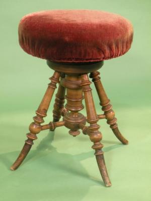 A Victorian mahogany piano stool