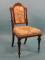 A Victorian carved walnut side chair