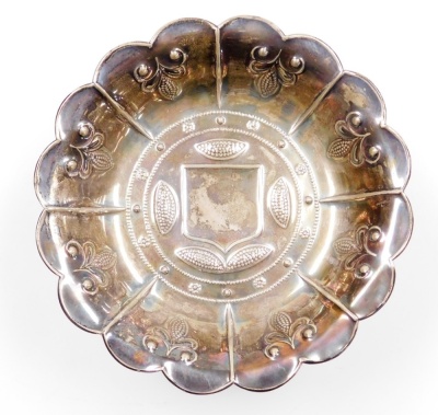 A George V silver sweet meat dish, with fluted body with raised embossed detailing, maker J D and S, London 1931, 10cm high, 12½oz of weighted silver. - 2