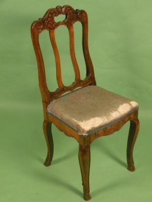 An early 19thC French Provincial walnut side chair with a rail back padded