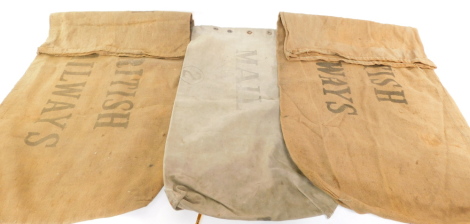 Two Royal Railways jute mail sacks, 70cm high, 120cm wide, and a US Mail sack, no 2, 3-63, 60cm high, 90cm wide. (3)