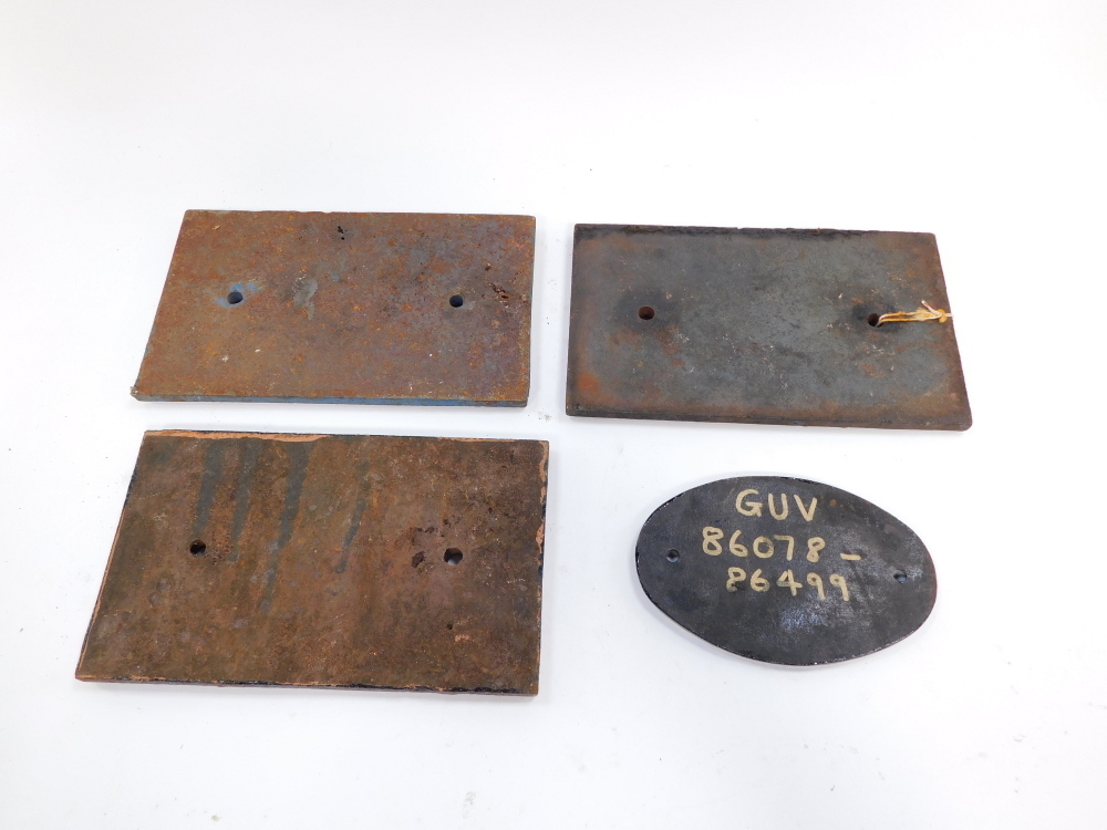 Three British Rail cast iron wagon plates, comprising B 1969, W 1962 and E 1968, and an oval
