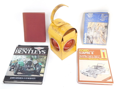 R S Lyons. Sir Malcolm Campbell's Book of Famous Motorists, first edition, published 1937., Haynes Ford Capri II., Minor Owner's Workshop Manual., John Adams & Ray Roberts. A Pride of Bentley's., and a vintage Chelwyn Parker Road Traffic Warning lantern f