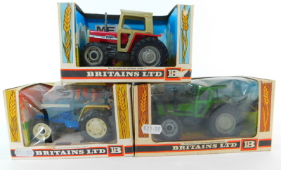 Three Britains die cast models of tractors, scale 1:32, comprising a Deutz tractor 9526., Massey Ferguson tractor 9522., and a Ford Tractor 9524, all boxed.