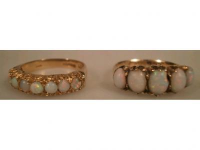 Two 18ct opal set dress rings