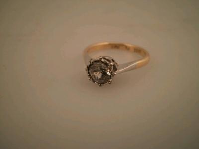 A solitaire diamond ring of 0.50ct approx. in rub over setting