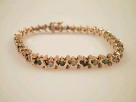 An emerald and diamond set bracelet