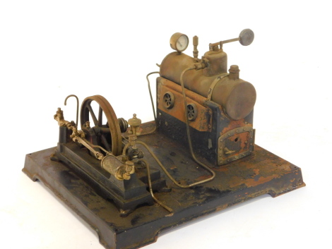 A tin plate and brass steam pump, possibly Jensen.