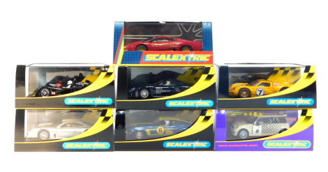 Seven Scalextric Racing Cars, boxed.