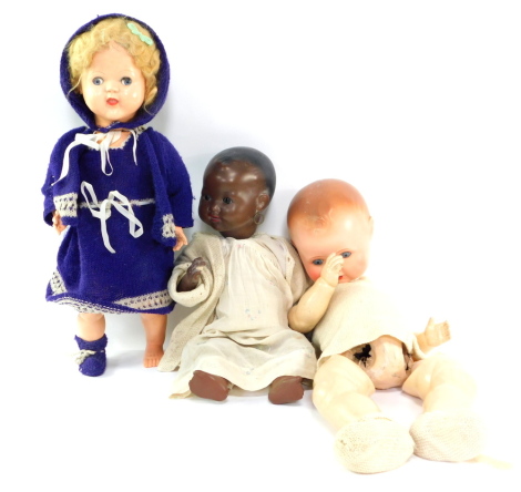 The British Dollies black bisque head doll, German bisque head doll 264K/8, and a Palitoy doll. (3)