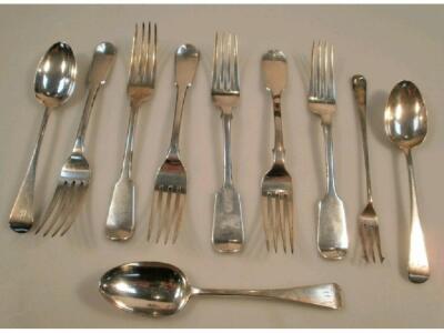 A composite set of six Victorian silver fiddle pattern dinner forks