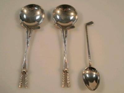 A pair of late Victorian silver golf trophy spoons