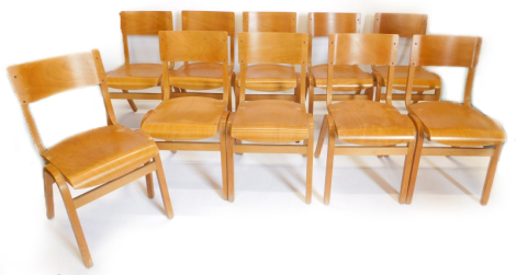 A set of ten church laminated stacking chairs.