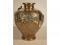 A heavy brass baluster vase cast with an encircling band of graduated lions