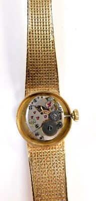 A 9ct gold Tissot lady's wristwatch, with gold coloured small dial, on a bark effect bracelet, the dial 1.5cm wide, 15.5cm long, 20.8g all in. - 3