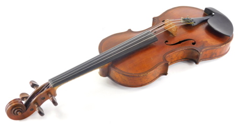 A late 19th/early 20thC violin, with ebonised stringing, the back in highly figured burr maple, no label, length of back 37cm.