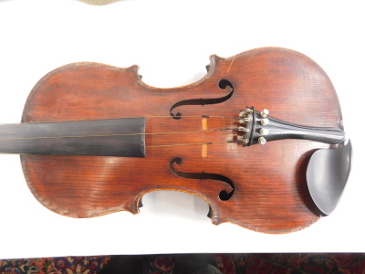 A violin, of plain form with one piece back, printed label to interior, Medio-Fino, length of back 35.5cm, sold with a bow, with nickel plated mounts, cased, etc. - 3