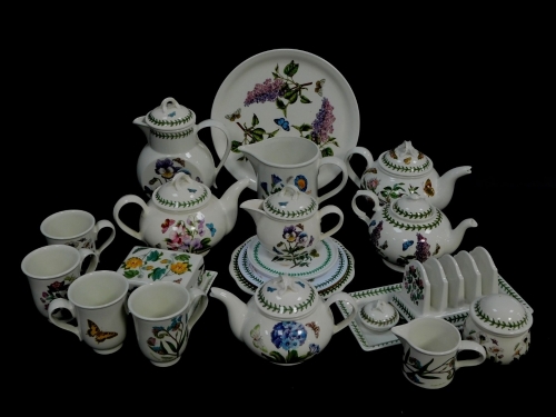 A group of Portmeirion teawares decorated in the Botanic Garden pattern, including teapots, covered hot water jug, pitcher, milk jugs, toast rack, cake and bread plates. (a quantity)