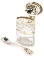 A Georgian cut glass and silver mustard pot, crest engraved, makers initials RN, together with a George IV mustard spoon, London 1826, and an Edward VII salt spoon, Birmingham 1907.