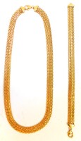 A 9ct gold necklace and bracelet set, the necklace of multi link articulated form, with clip clasp, 42cm long, the bracelet 19cm long, 15.2g.