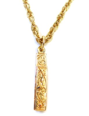 A 9ct gold pendant and chain, the pendant of rectangular design, with various twist panels, floral engraved, on a fancy link chain, the pendant 2cm high, the chain 45cm long, 12.1g all in. - 2