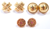 Three pairs of 9ct gold earrings, comprising a pair of 9ct gold ball stud and rope twist earrings, a pair of 9ct gold bordered cross earrings, and two 9ct gold and garnet set cluster earrings, some bent, 5.8g all in.