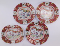 A group of 19thC Mason's ironstone pottery, chinoiserie decorated with a fence and garden pattern, within a red border with floral reserves, printed marks, comprising an oval meat platter, soup plate and pair of dinner plates. (4)