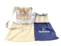 A Burberry across the body bag, in blue check coated fabric, with tan leather trim and fabric strap, 26cm high, 26cm wide, 7cm deep, and a Burberry Nova check coated fabric shoulder bag with black leather strap, 14cm high, 24cm wide, 6cm deep, both sold w