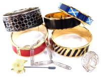 A group of modern costume jewellery, to include five Halcyon Days enamel bangles, to include four hinged examples and one with Scottish decoration, a Royal Crown Derby floral posy pin and two Rennie Mackintosh Collection silver jewellery items. (a quantit