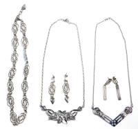A group of Rennie Mackintosh collection and design jewellery, to include V shaped necklace, drop earrings, heart shaped weave design earrings, a multi length silver plated necklace, etc. (3 necklaces and 2 pairs of earring)