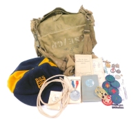 A WWII Romac military canvas bag, BGS School cap, a Vermin Club badge, Scout and Guide badges, further badges, a commemorative medal for the Silver Jubilee of King George V and Queen Mary, and a New Testament. (a quantity)